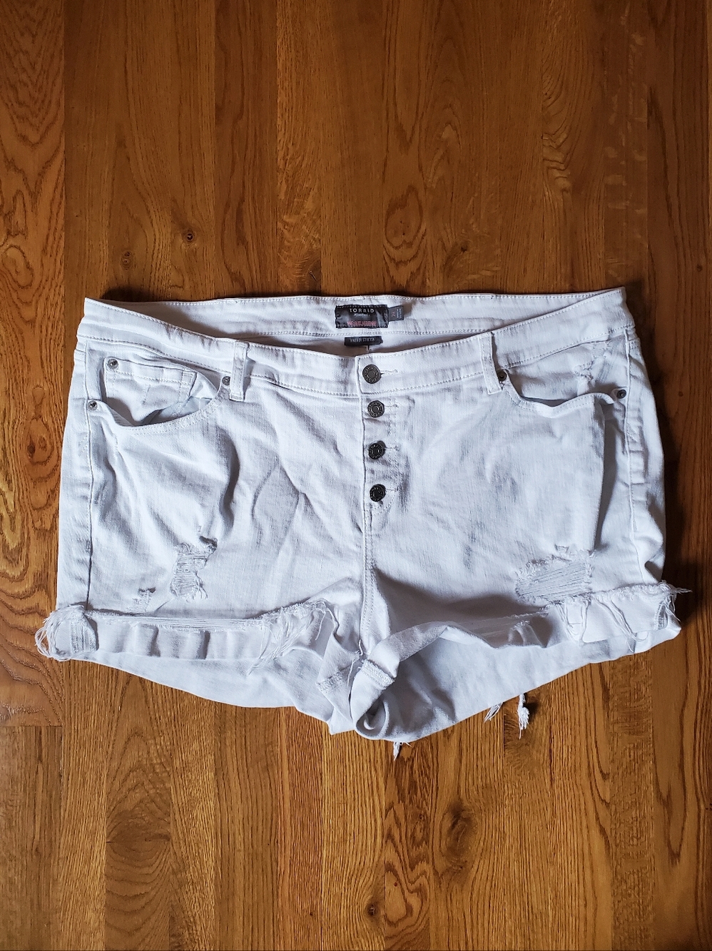 Torrid White Distressed Button-Front Denim Shorts. Size: 24.